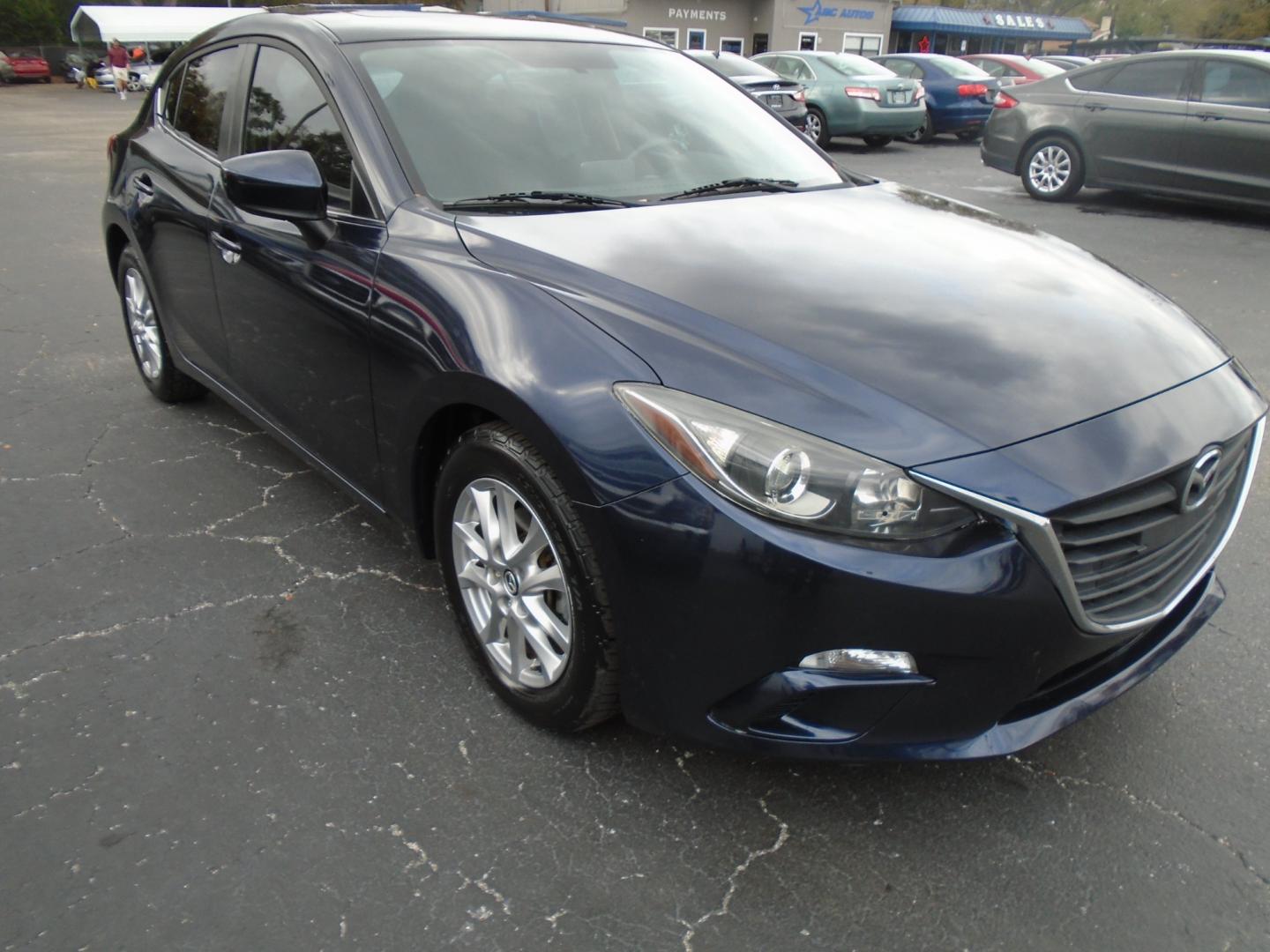 2014 Mazda MAZDA3 (JM1BM1M73E1) , located at 6112 N Florida Avenue, Tampa, FL, 33604, (888) 521-5131, 27.954929, -82.459534 - Photo#2